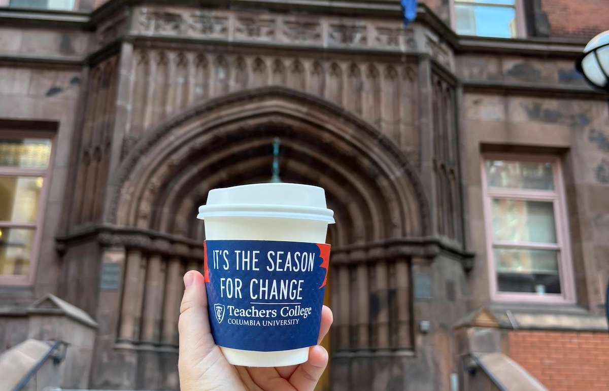 To-go coffee cup that says 