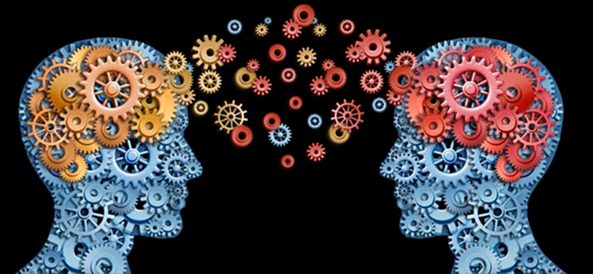 illustrative graphic of two heads facing each other with colorful wheels floating between them