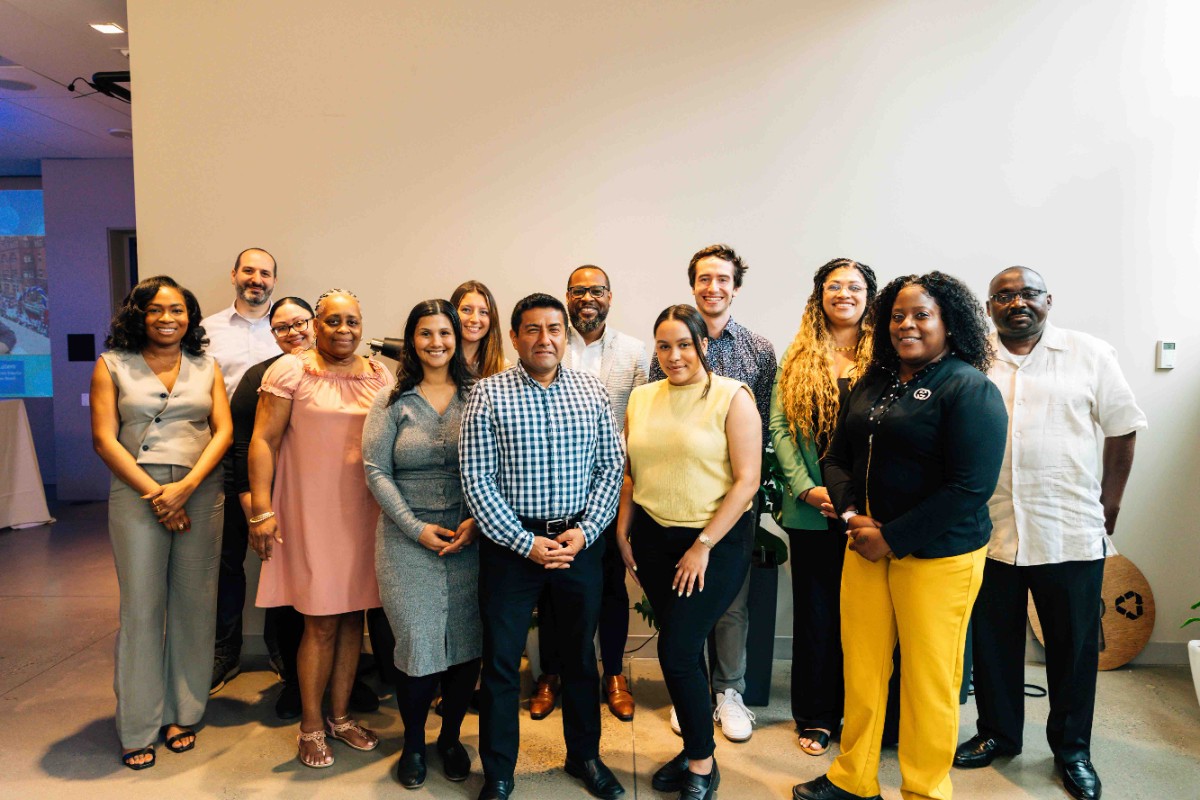 A picture of a group of people posing for a picture