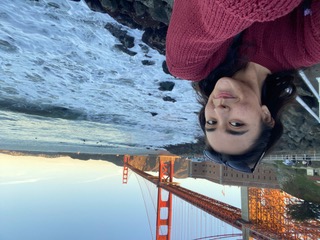 Headshot of student in front of the Golden Gate Bridge