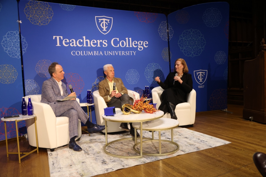 3 presenters seated on a stage at TC Alumni Day 2024
