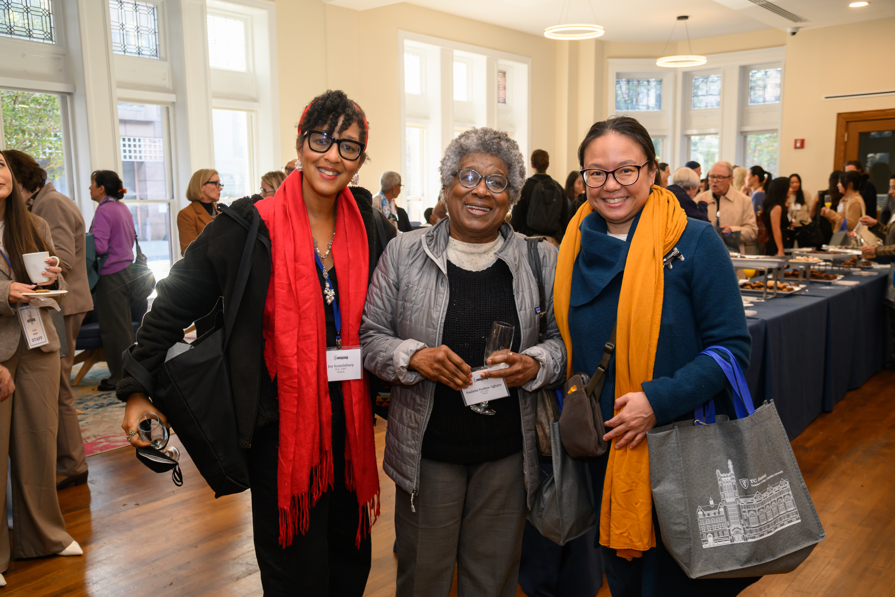 TC Alumni Day 2025 People Standing in Everett Lounge
