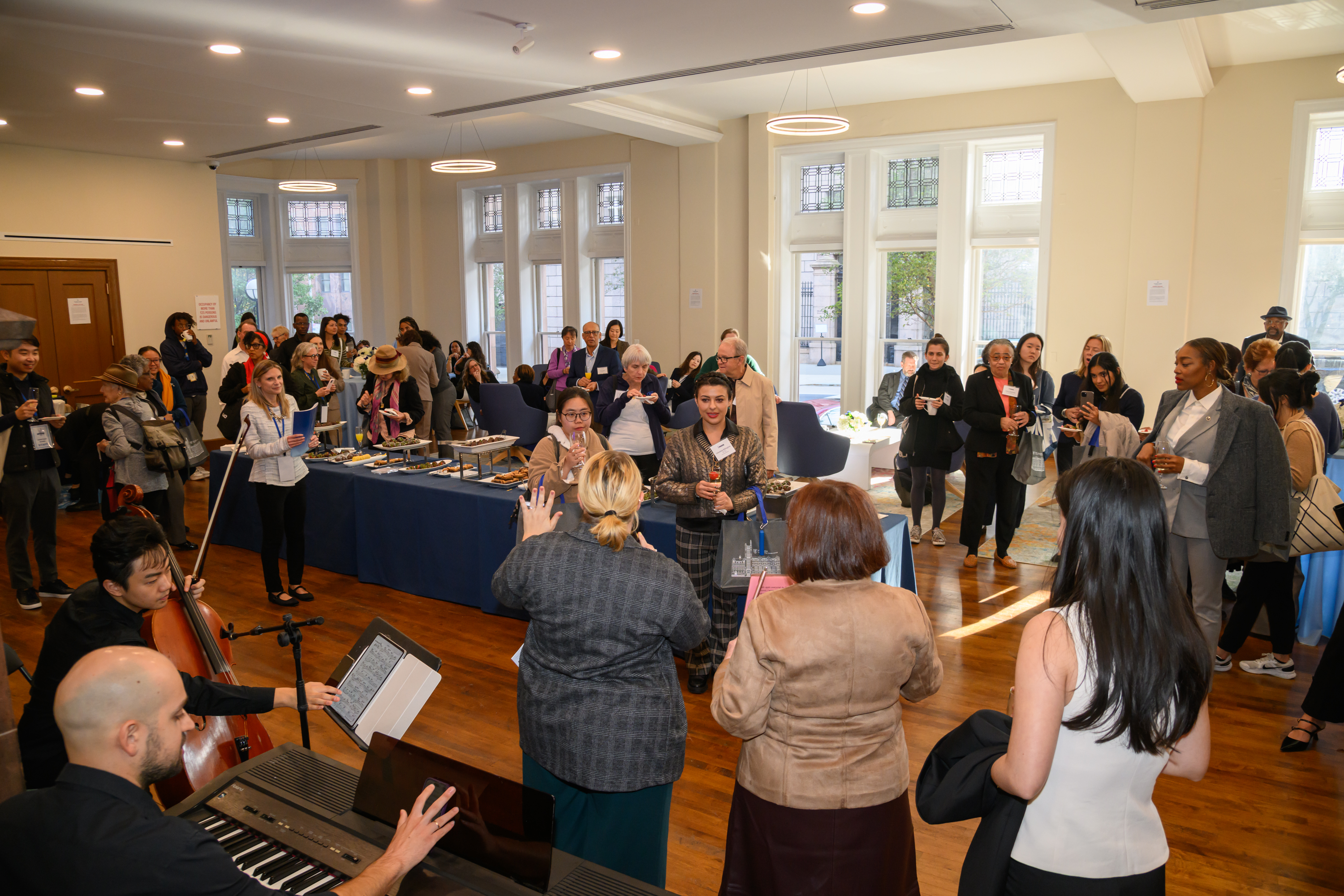 TC Alumni Day 2025 People Gathered in Everett Lounge
