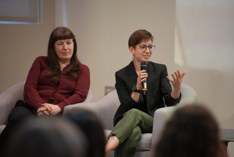 Sarah Gerth van den Berg talking in a panel