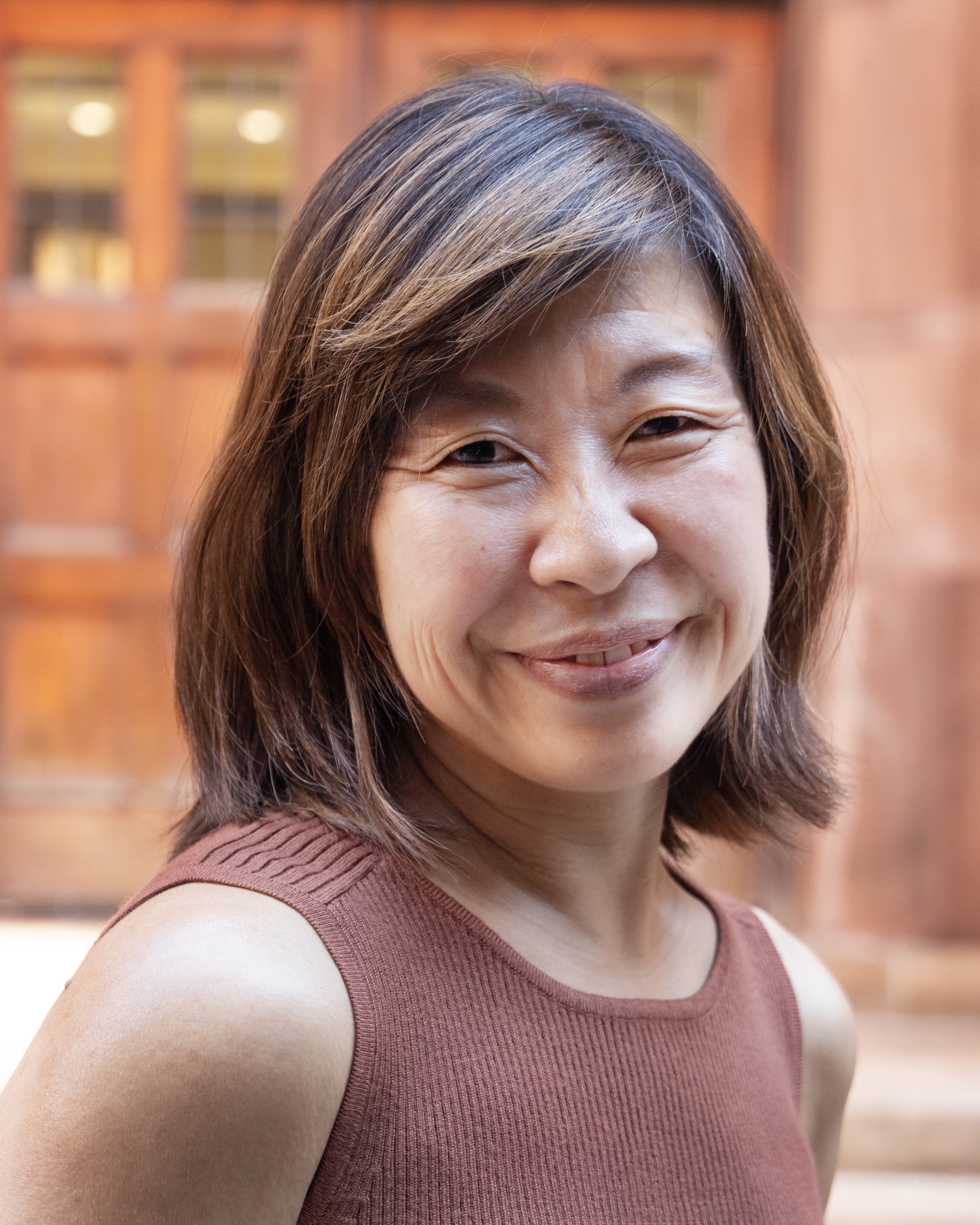 Ayuko smiles at the camera