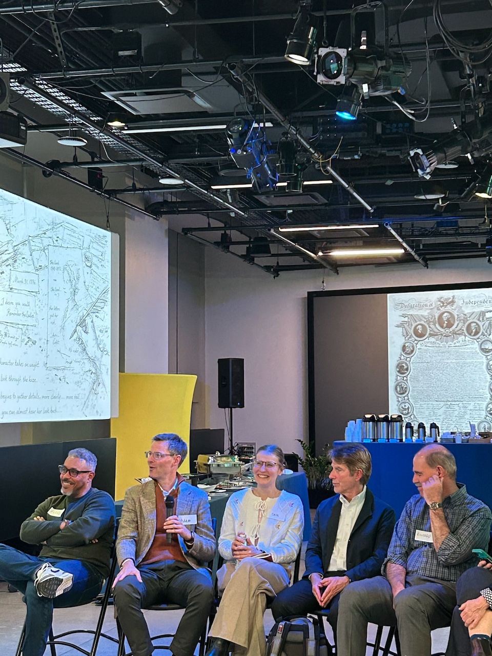 A group of people sitting at the Imagine Liberty event