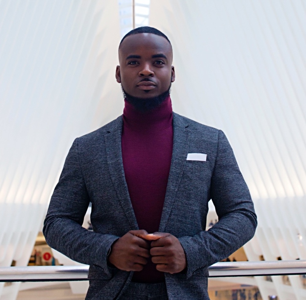 Antonio Javar Hairston posing in a futuristic building
