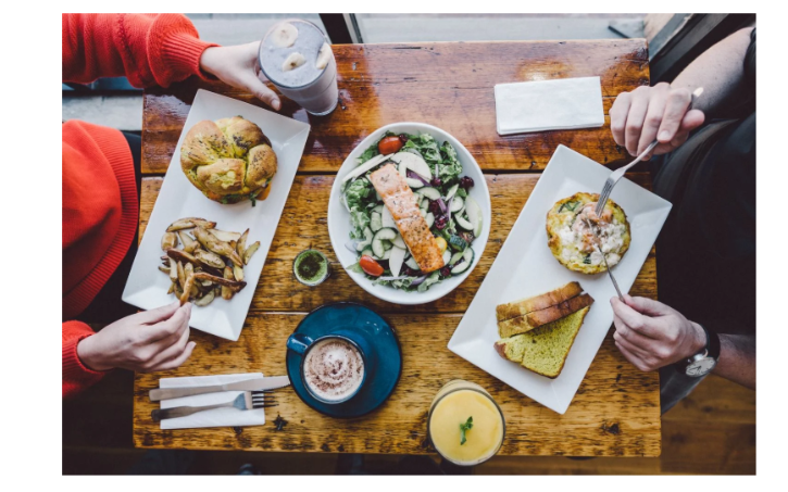 People dining on food