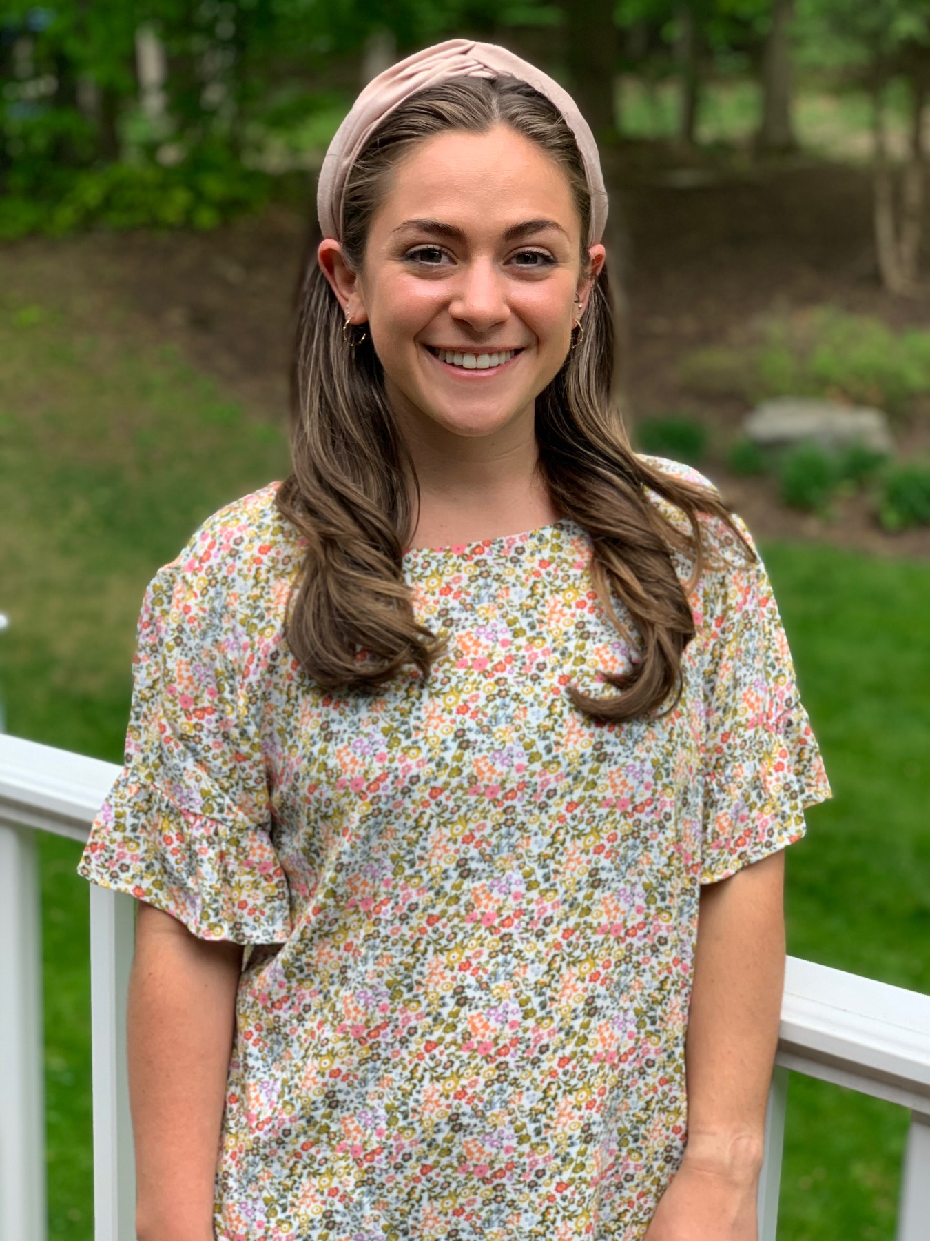 A student smiling for a photo