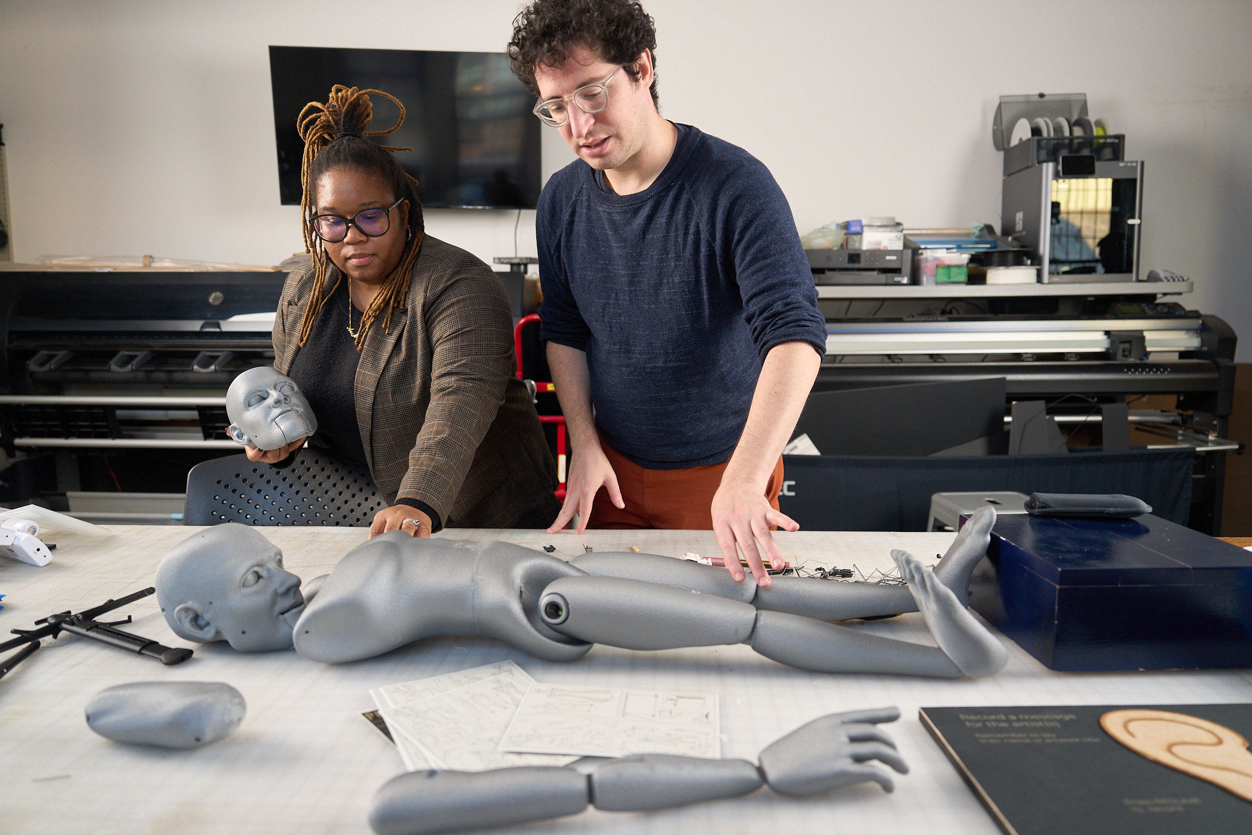 Students working with robot