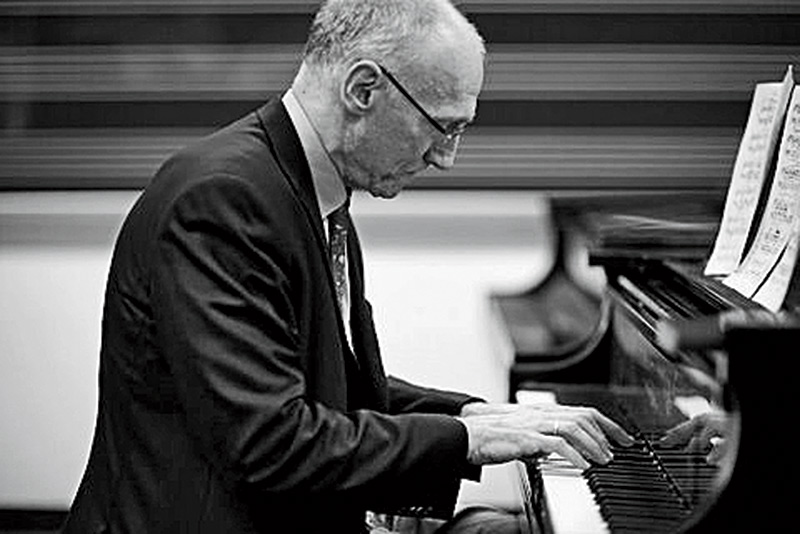 Tom Bailey at the piano