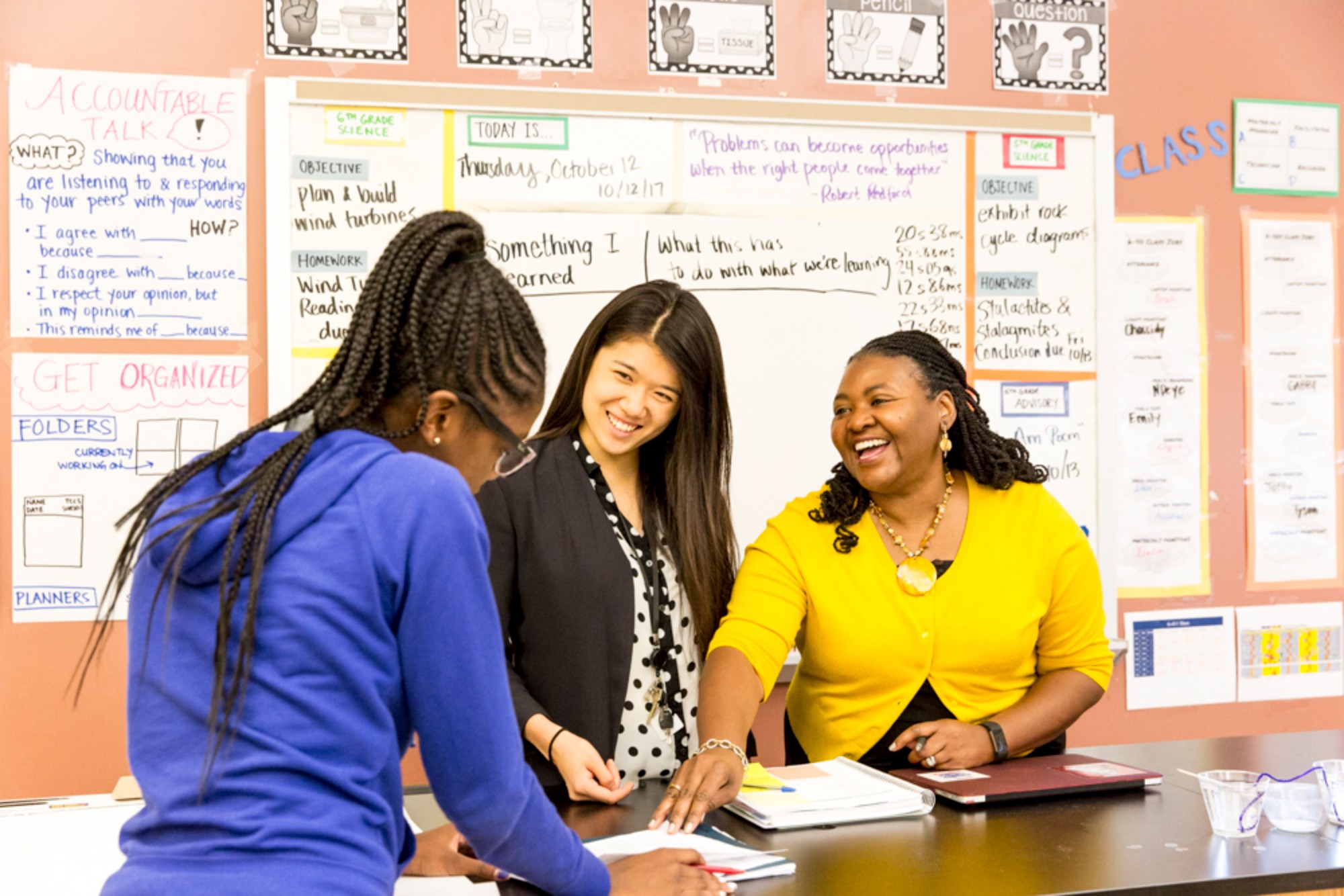 Students and teachers in classroom.