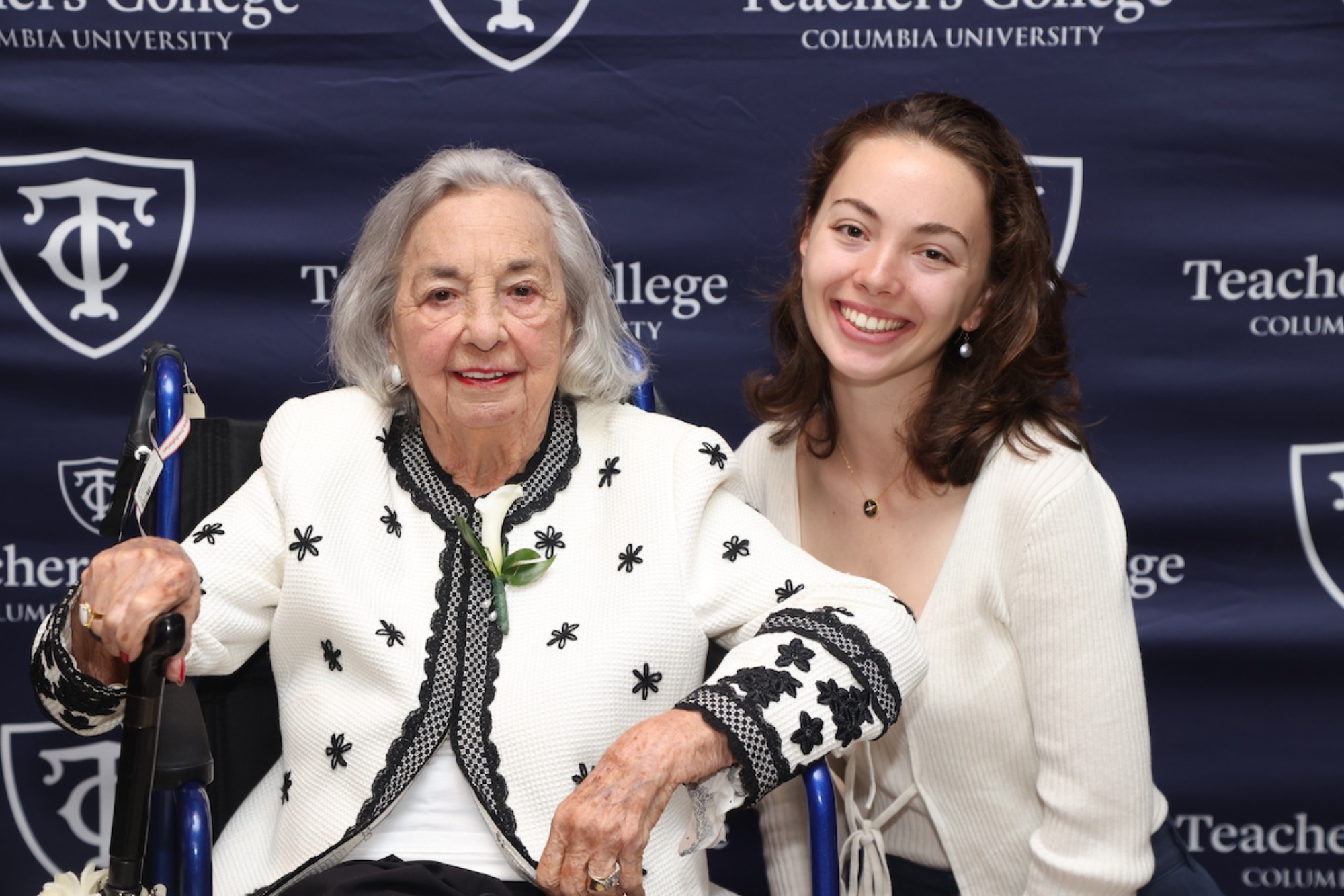 Joyce Cowin smiling with granddaughter