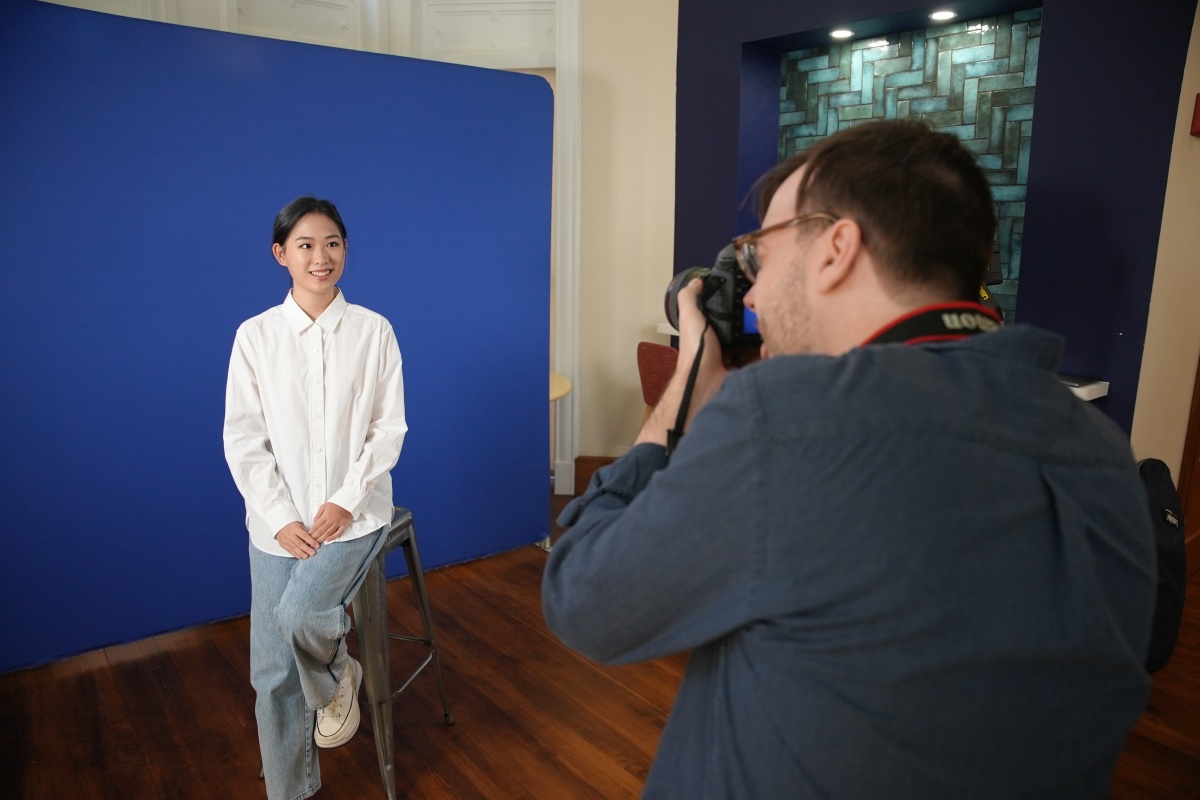 DFI takes student headshots as part of the EdTech Career Fair for students.