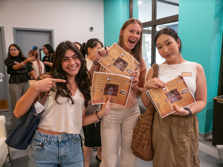 Students pose for a picture during the campus scavenger hunt.