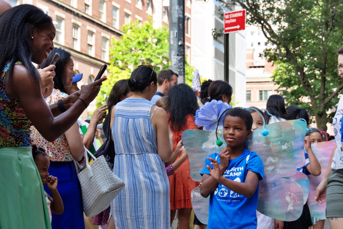 A camper wears his butterfly wings during the Hollingworth Science Camp Parade