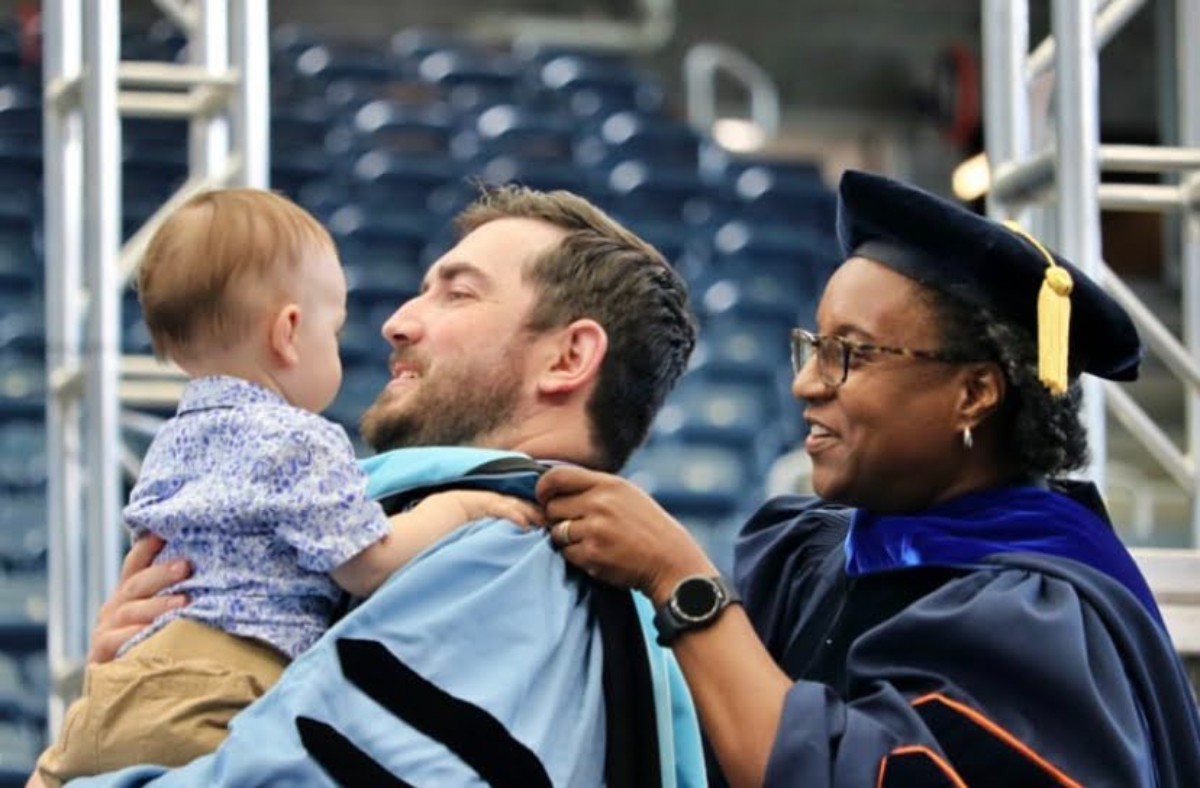 Pictured: Chase getting hooded.