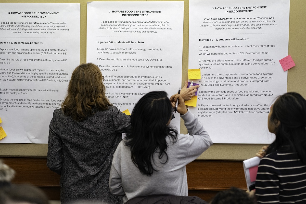 Three women making suggestions on policy changes