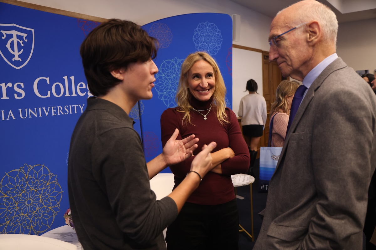 Michael and Monique Herena with President Thomas Bailey