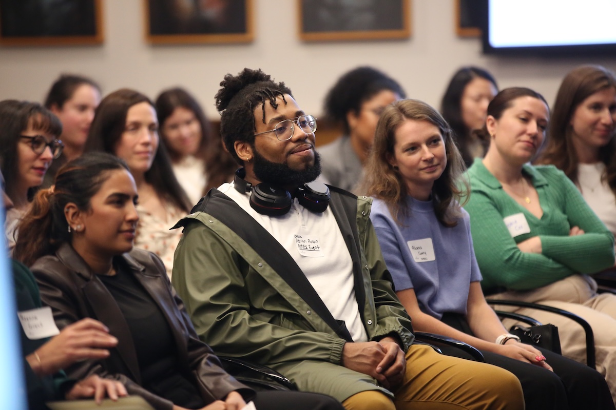 Students from the Social-Organizational Psychology program enjoy the fireside chat.