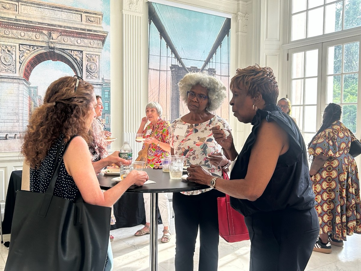 TC alumni at the Shirley Chisholm exhibit.