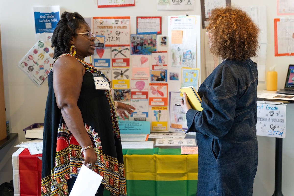Two teachers deep in discussion -BERC Conference 2025
