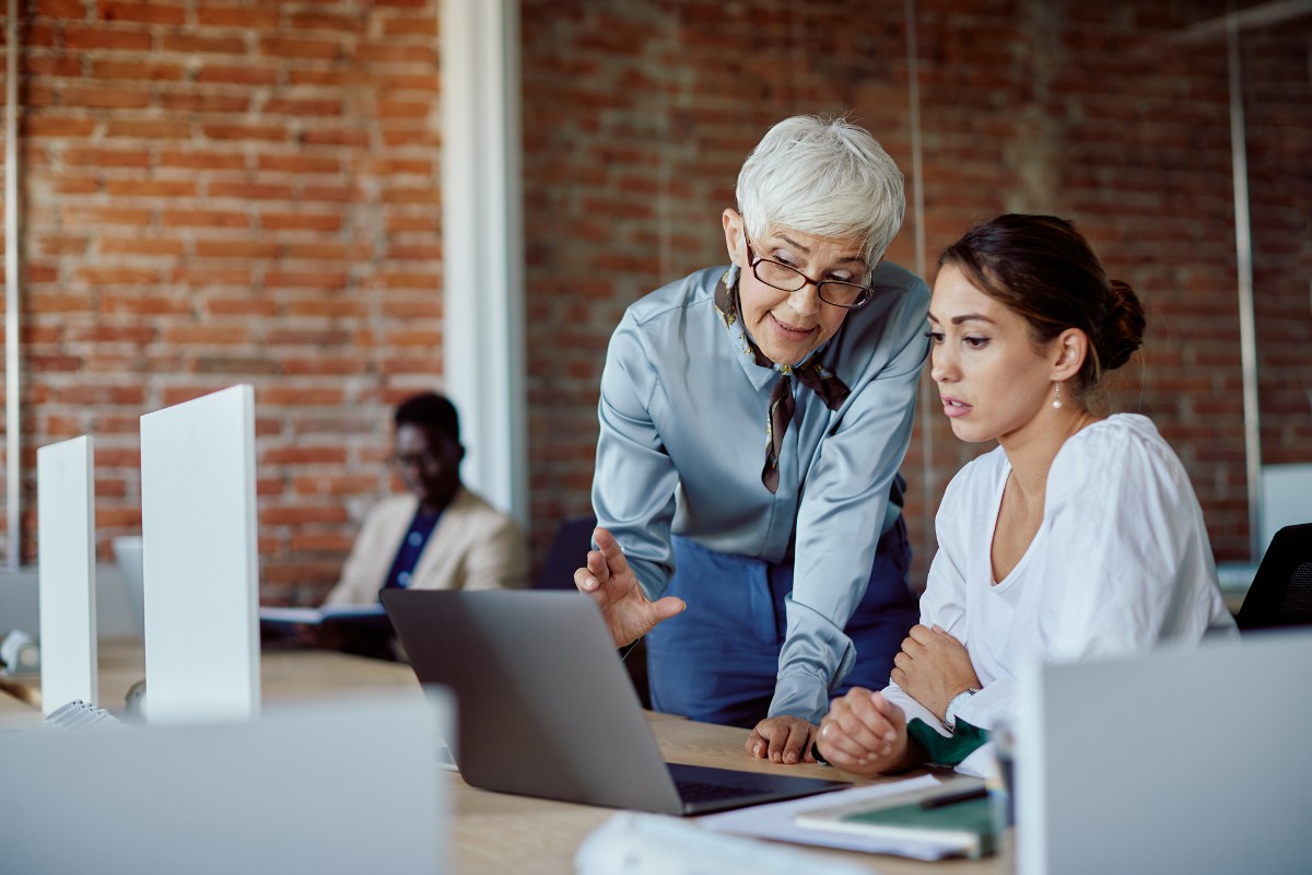 Teachers talking with one another.