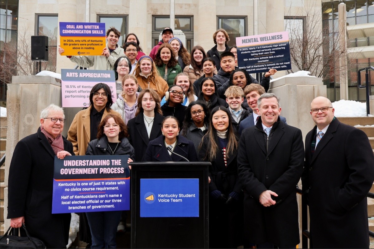 Pictured: Michael Rebell and students.