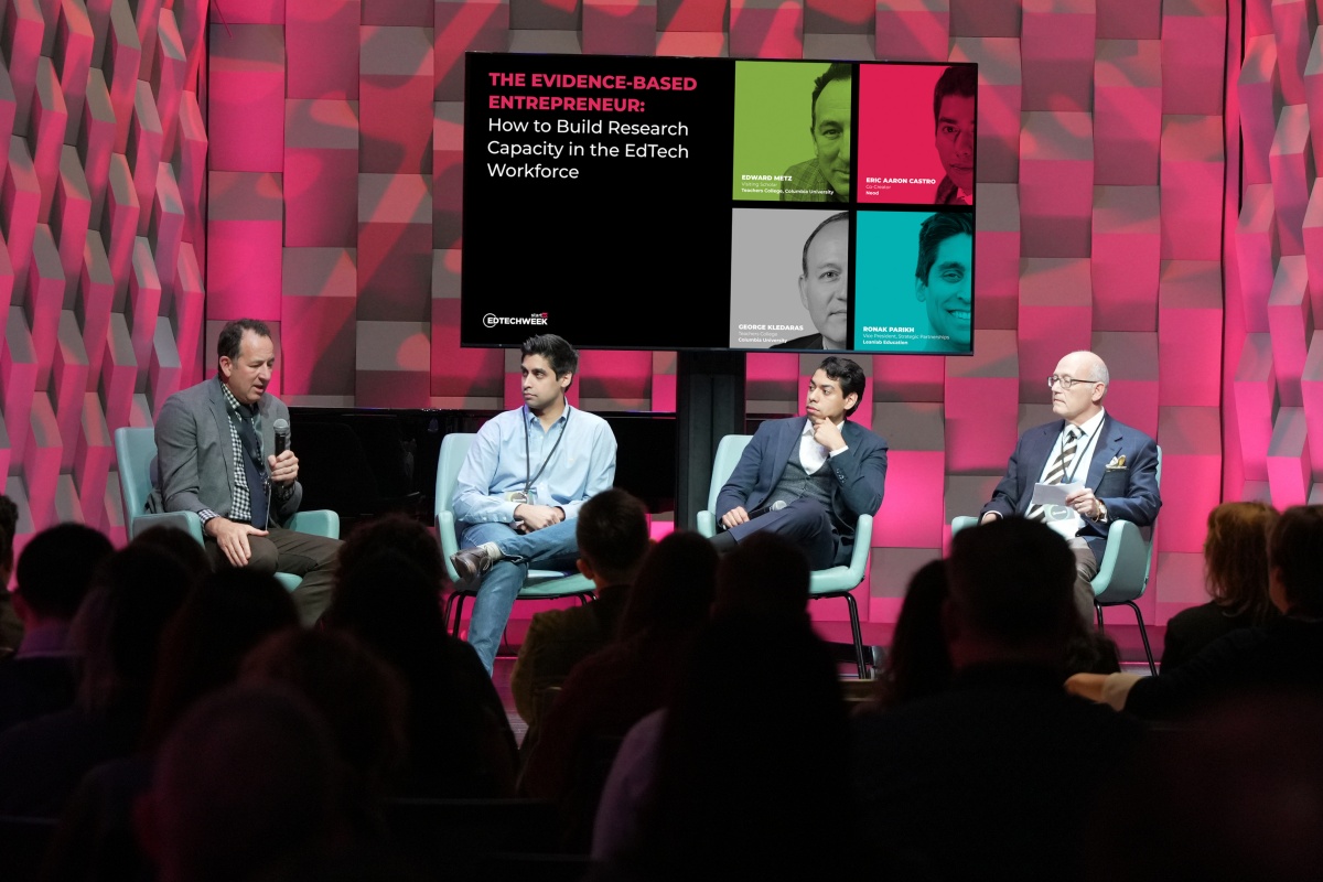 Ed Metz and George Kledares on a tech panel