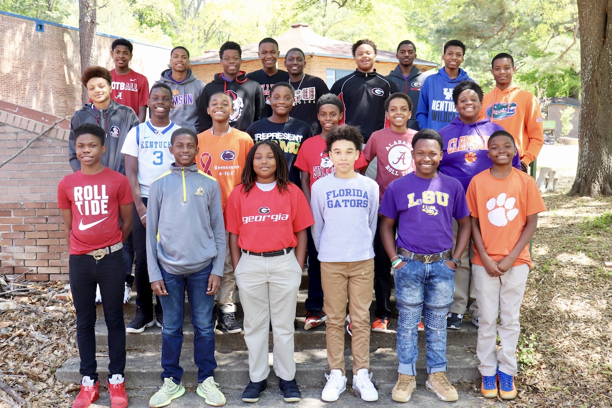 Boys in college gear-BrandonMartinAlumProfile