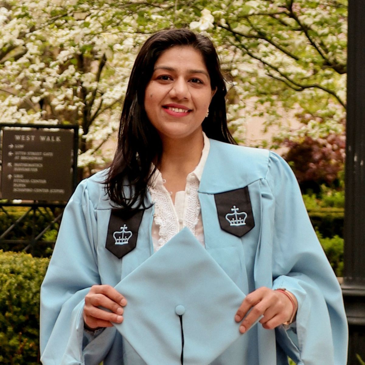 Chyanika Bajaj smiling in her Columbia regalia