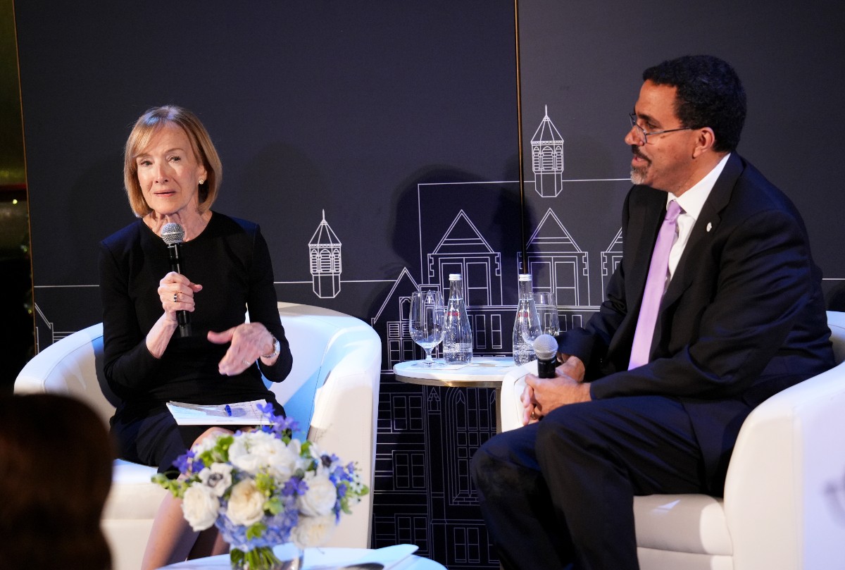 Pictured: Judy Woodruff and John B. King.